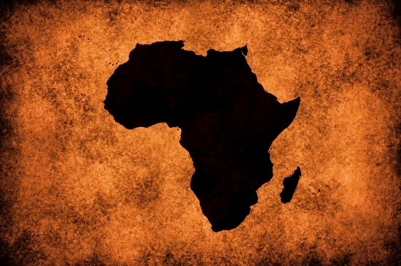 A map of africa is shown on an orange background.